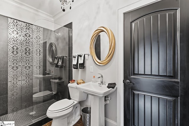 full bath with toilet, a stall shower, and ornamental molding