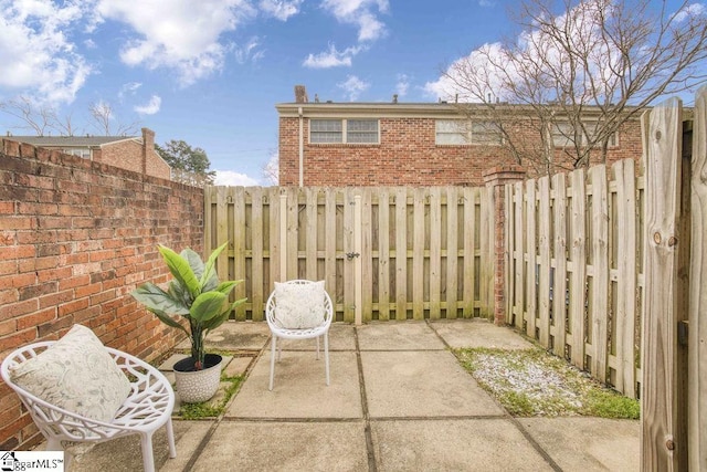 view of patio featuring a fenced backyard