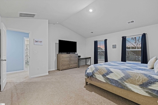 bedroom featuring lofted ceiling, carpet floors, baseboards, and visible vents