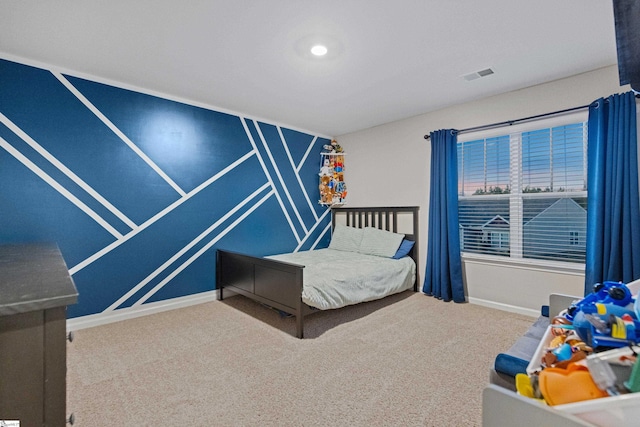 bedroom featuring carpet floors, baseboards, and visible vents