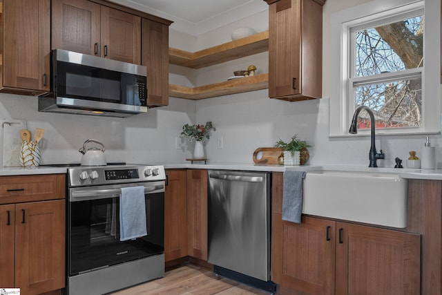 14 Arden Street Units A & B, Greenville, SC 29607 - kitchen with stainless steel appliances, open shelves, a sink, and light countertops