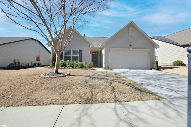 ranch-style house featuring driveway and an attached garage