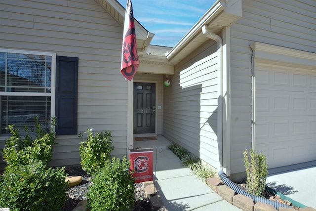 entrance to property with a garage