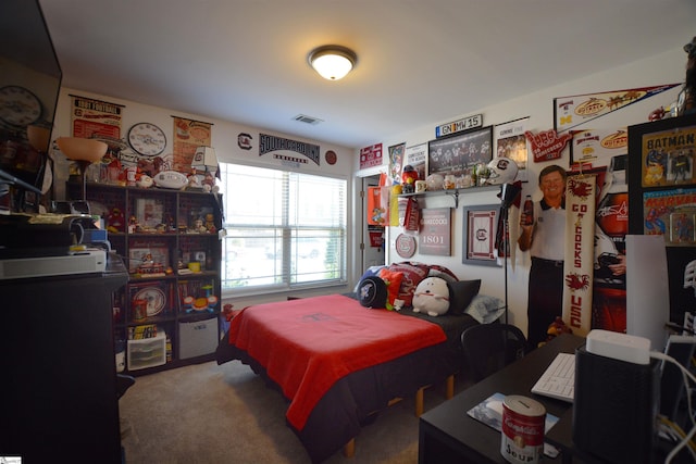 bedroom featuring carpet flooring and visible vents