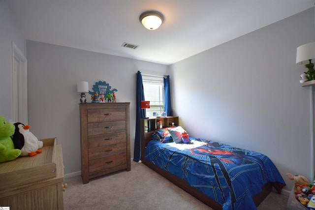 bedroom featuring carpet floors and visible vents