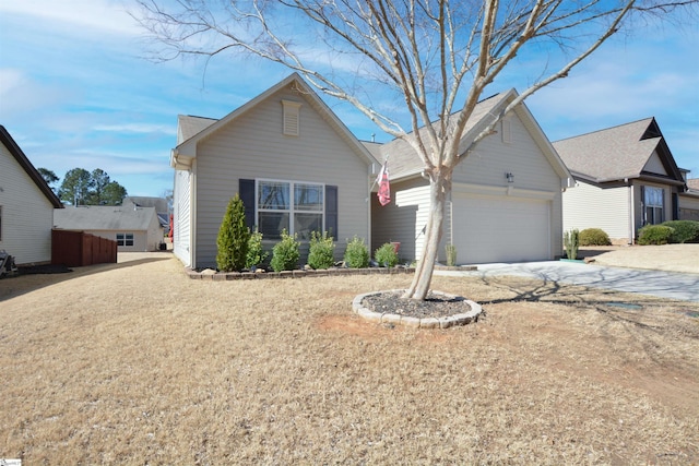 view of front of property featuring a garage and driveway