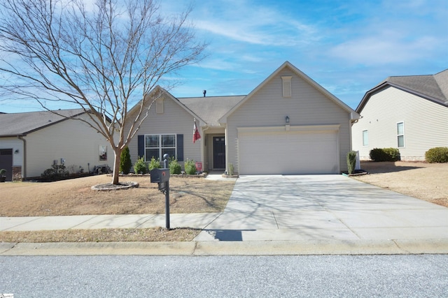 single story home featuring an attached garage and concrete driveway