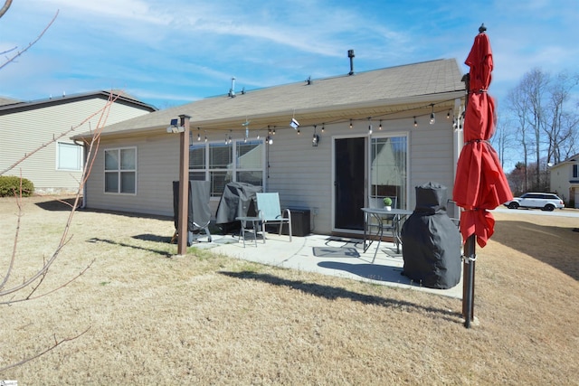 back of property featuring a patio