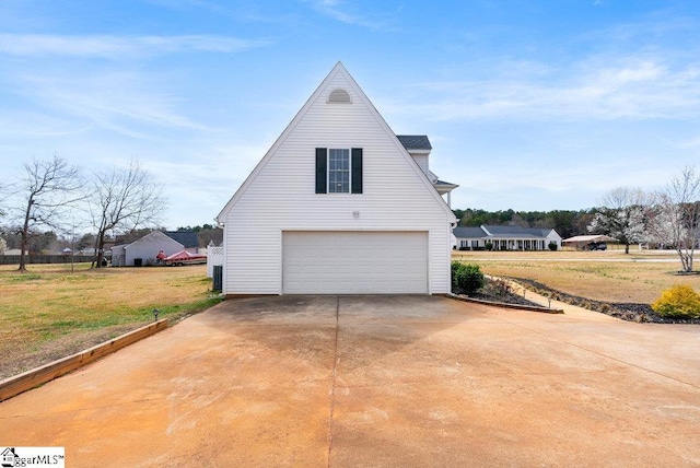 view of property exterior with a lawn