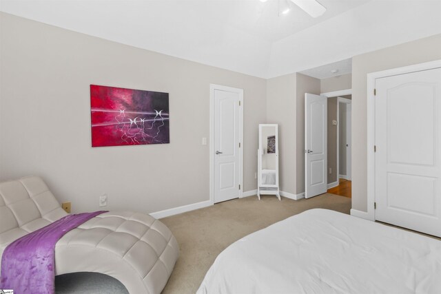 bedroom featuring carpet floors and baseboards