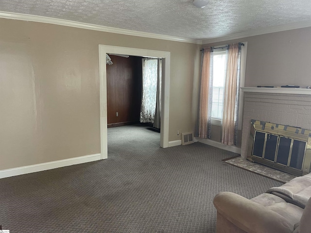 unfurnished living room featuring carpet floors, visible vents, ornamental molding, and baseboards