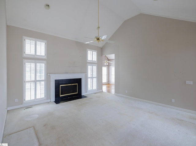 unfurnished living room with high vaulted ceiling, a tiled fireplace, carpet flooring, and a ceiling fan