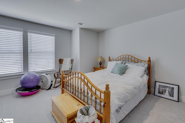 bedroom featuring carpet and visible vents