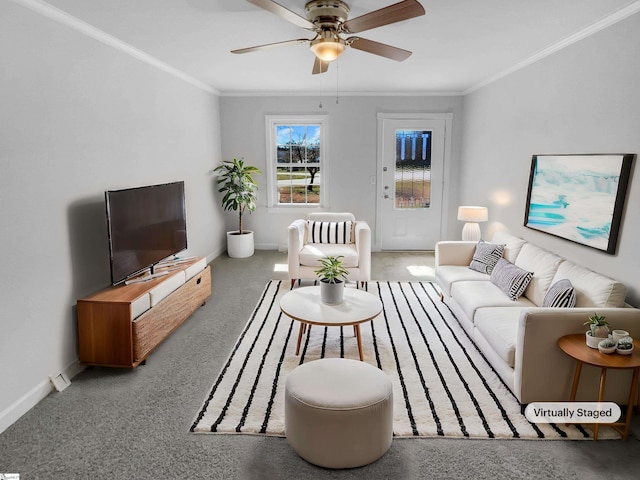 living area with ceiling fan, crown molding, baseboards, and carpet floors