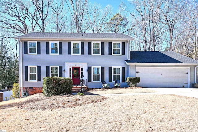 colonial house featuring a garage, crawl space, driveway, and roof with shingles