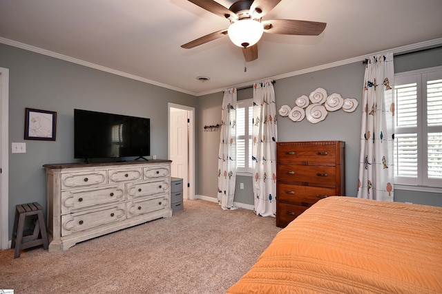 bedroom featuring light colored carpet, visible vents, baseboards, a ceiling fan, and ornamental molding