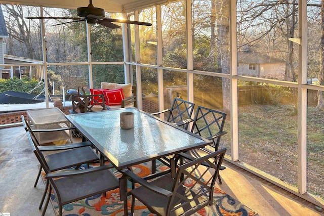 sunroom / solarium with ceiling fan