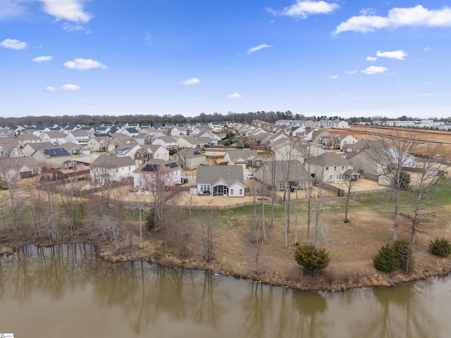 aerial view with a residential view and a water view