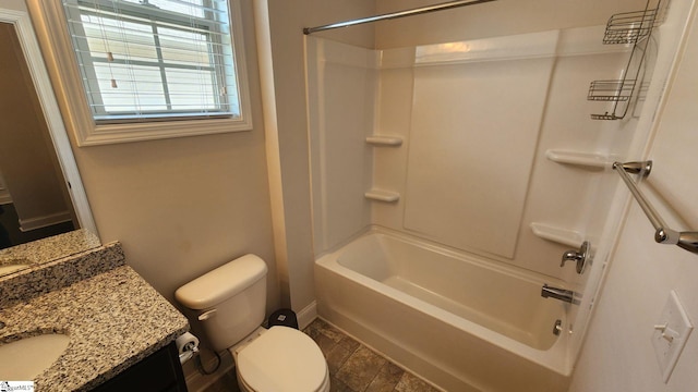 bathroom featuring toilet,  shower combination, and vanity