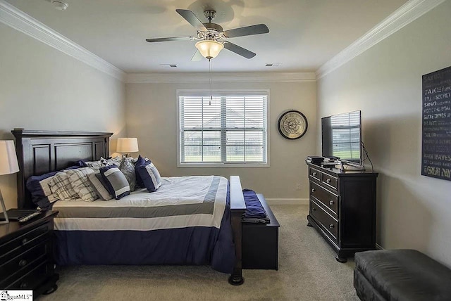 bedroom featuring visible vents, a ceiling fan, carpet, crown molding, and baseboards