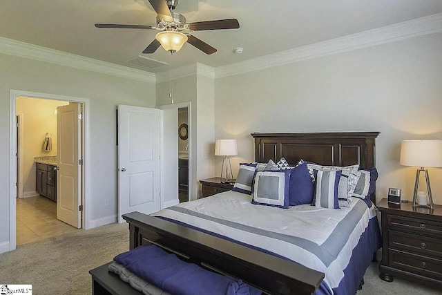 bedroom featuring ensuite bath, crown molding, light colored carpet, and baseboards