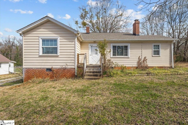 single story home featuring a front yard, crawl space, and a chimney