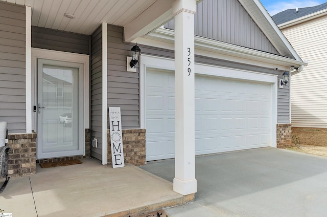 garage featuring driveway