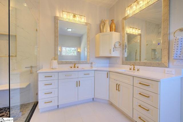 full bathroom with a marble finish shower and vanity