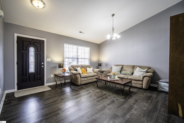 living area featuring a notable chandelier, baseboards, vaulted ceiling, and dark wood-style flooring