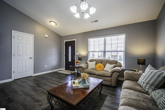 living room with baseboards, visible vents, wood finished floors, vaulted ceiling, and a notable chandelier