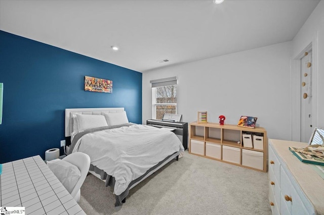 carpeted bedroom featuring visible vents and recessed lighting