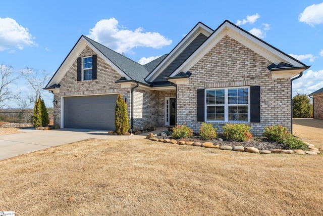 view of front of home with a garage, concrete driveway, brick siding, and a front lawn