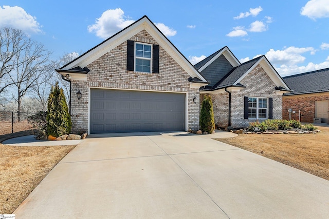 view of front of house with concrete driveway and brick siding