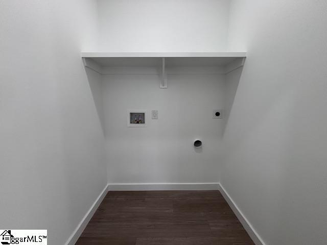 washroom featuring washer hookup, laundry area, electric dryer hookup, baseboards, and dark wood-type flooring