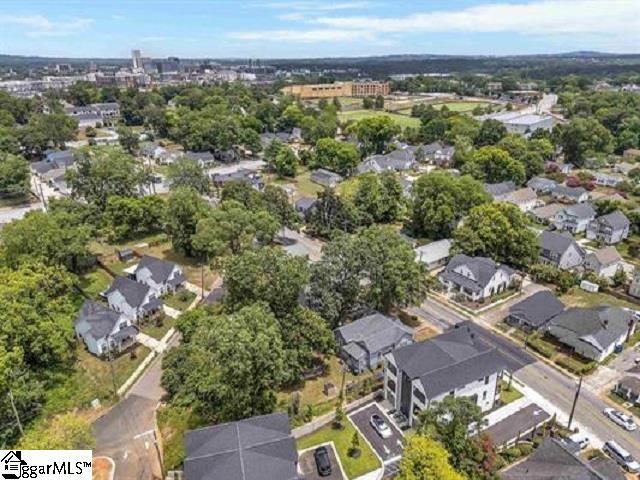 birds eye view of property with a residential view