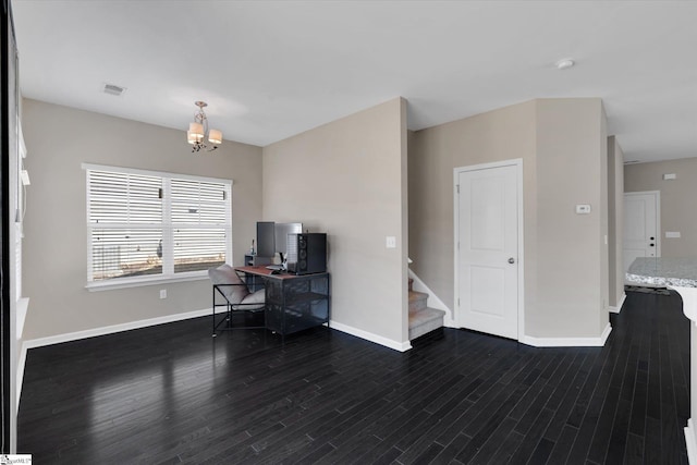 office space with a chandelier, dark wood-style flooring, visible vents, and baseboards