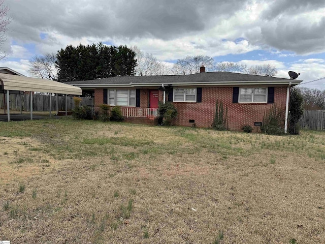 single story home featuring brick siding, a carport, fence, a front yard, and crawl space