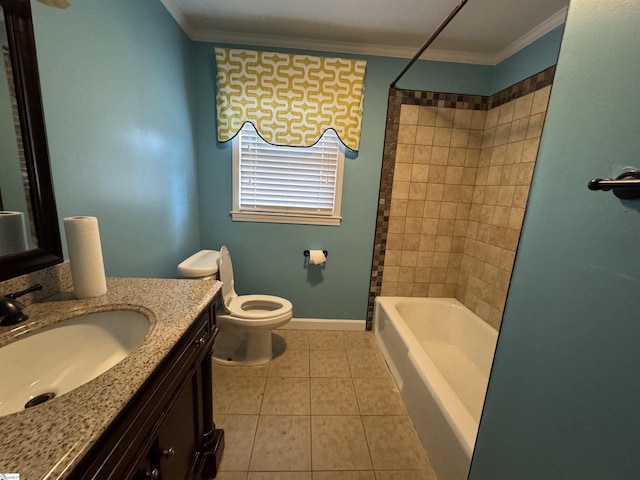 bathroom with baseboards, toilet, ornamental molding, tile patterned floors, and vanity