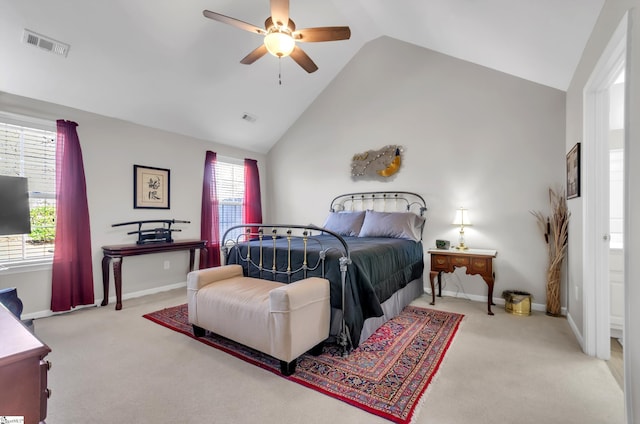 carpeted bedroom with visible vents, multiple windows, and baseboards