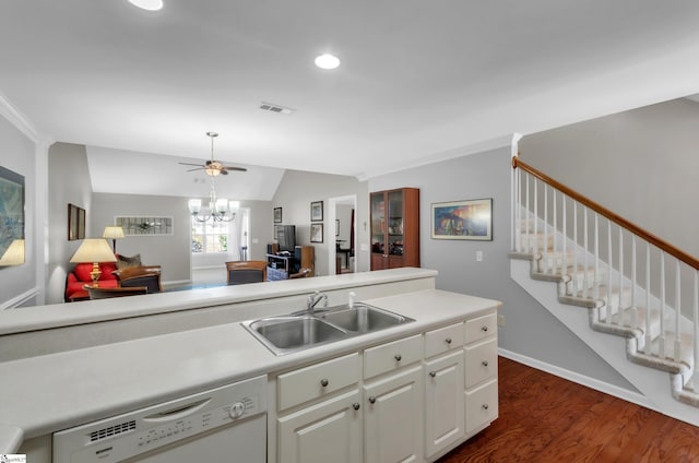 kitchen with a sink, dishwasher, lofted ceiling, white cabinetry, and dark wood-style flooring