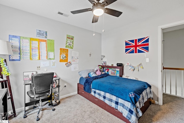 bedroom featuring carpet flooring, ceiling fan, baseboards, and visible vents