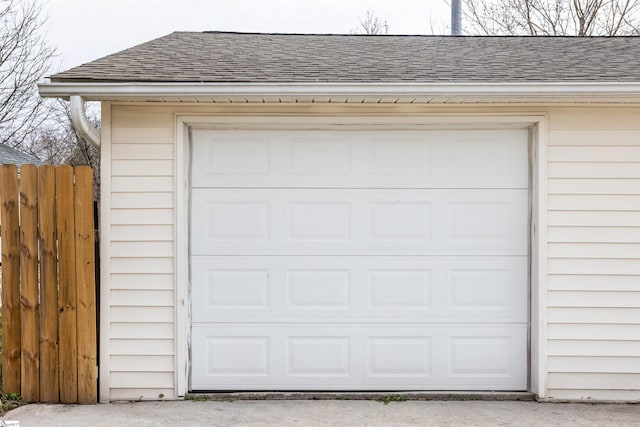 garage with fence