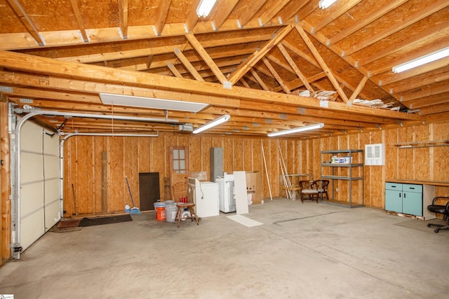 garage with washer and dryer and visible vents