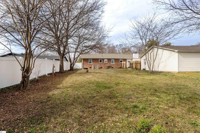 view of yard with fence