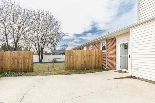 view of patio / terrace featuring fence