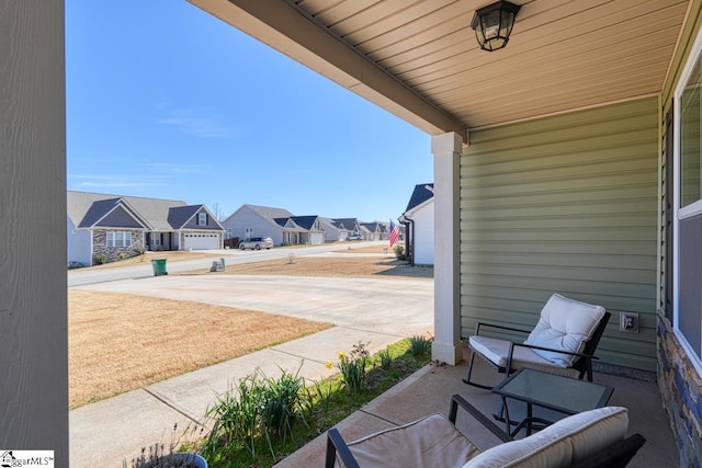 view of patio / terrace with a residential view