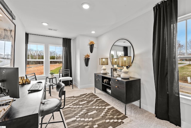 carpeted home office with recessed lighting, visible vents, and baseboards