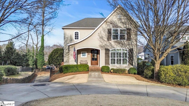 view of front of property with fence