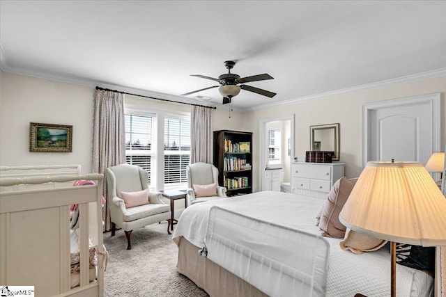 bedroom featuring light colored carpet, crown molding, and a ceiling fan