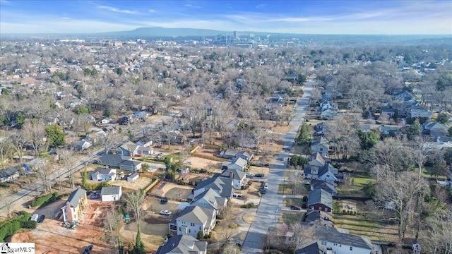 birds eye view of property with a residential view